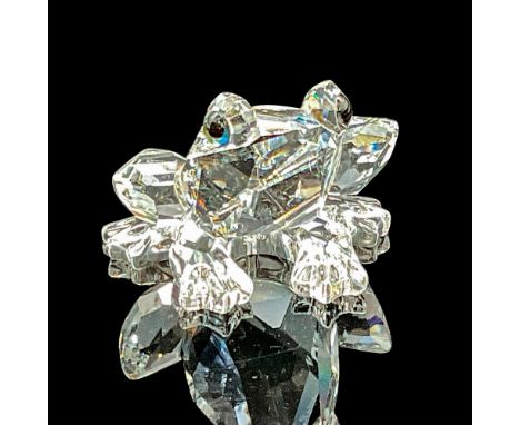 This Swarovski crystal frog was a member of the In the Secret Garden theme. It is made from clear crystal and has black and g