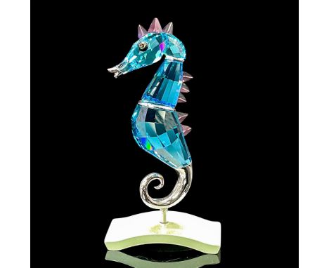 This Swarovski Paradise seahorse was part of the Exotic Fish and South Sea collection. It is aquamarine in color. Swarovski C