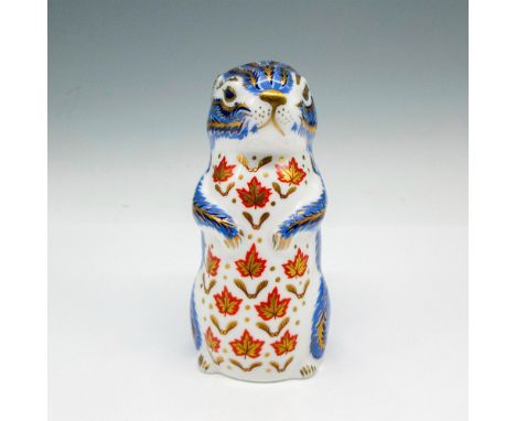 Part of the Imari Paperweight Collection. Adorable figural with blue, rust and gilding coloration throughout. Royal Crown Der