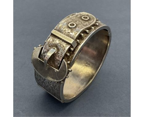 A silver buckle bangle, Birmingham, 1885, rubbed maker's mark.