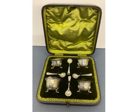 A cased set of four silver salts, Deakin &amp; Francis Ltd, Birmingham, date letters rubbed, four matched salt spoons, in a g