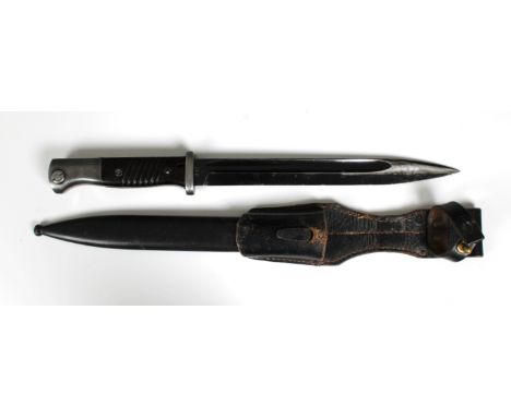 A German Third Reich 1938 K98 combat bayonet, scabbard &amp; frog by E.u.F. Hörster, matching serial numbers 999 or 666.