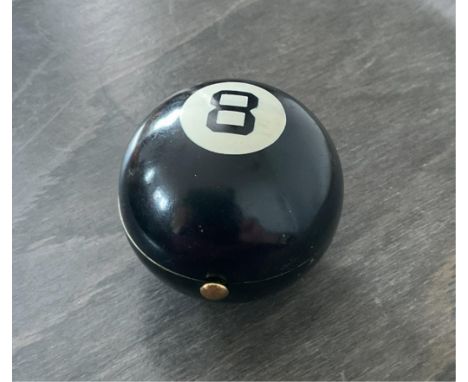 A rare 'Henriette' or 'Wadsworth' USA black '8 ball' enamelled novelty powder compact in the shape of a billiard ball, c.1930