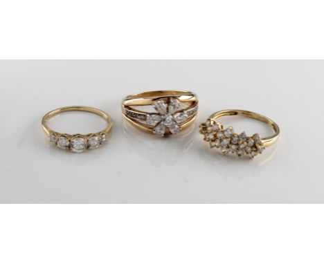 Three 14k yellow gold and cz rings, sizes R, T &amp; U, combined total gross weight approximately 11.8g
