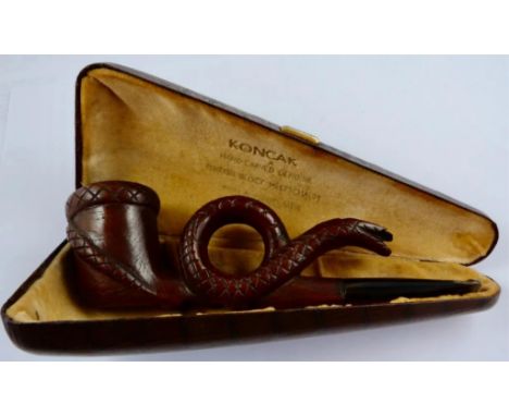 A novelty Turkish meerschaum pipe fashioned as a snake by Koncak, the underside carved wit ‘E.R’, in original case.