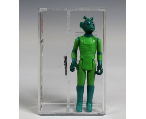 A loose, graded vintage Star Wars Greedo with original blaster., Cased in acrylic and graded by UK Graders. Figure 85 Paint 8