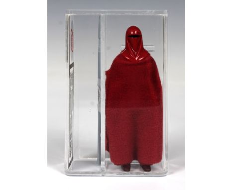 A loose, graded vintage Star Wars Emperor's royal guard with original staff and integral cloth cloak., Cased in acrylic and g