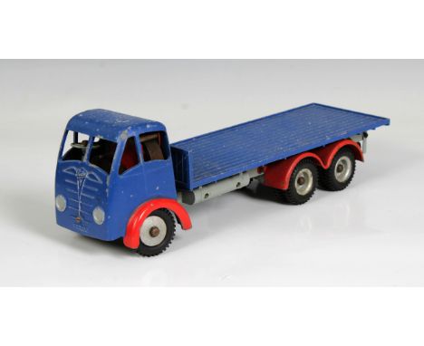 A good playworn Shackleton Model Foden FG Flat Truck, blue cab and back, red mudguards, grey fuel tanks and chassis, with key