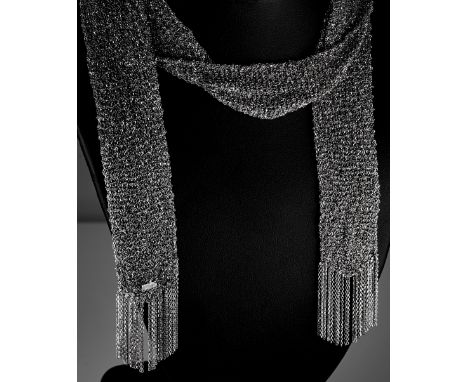 An 18ct white gold fine mesh link scarf necklace, marked "750", 86cm long, provenance: Stott &amp; Willgrass, St Helier, Jers