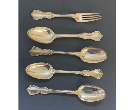 Four Victorian silver serving spoons, London, various makers, engraved initials, 22.1cm long, together with a similar fork, w
