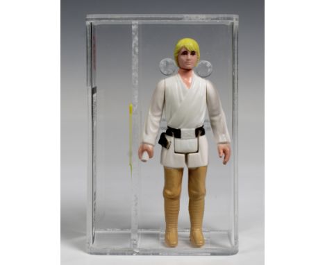 A loose, graded vintage Star Wars Luke Skywalker with original lightsaber., Cased in acrylic and graded by UK Graders. Figure