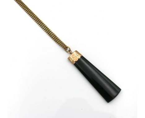 A 9ct gold and spinach jade pendant necklace, 50cm. long.