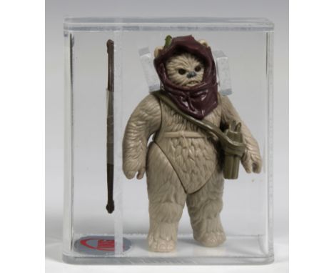 A loose, graded vintage Star Wars Warok with original bow, pouch and cowl., Cased in acrylic and graded by UK Graders. Figure