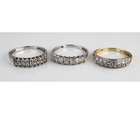 A 14k yellow gold and cz ring, size R, total gross weight approximately 2.5g; together with two 14k white gold and cz rings, 