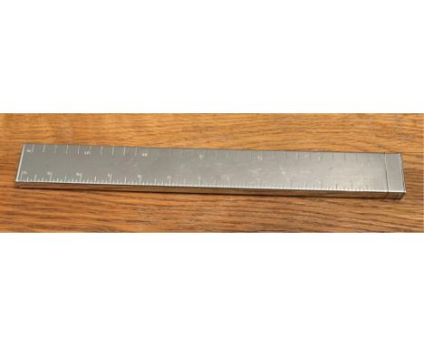 Alfred Dunhill - A novelty silver plated lighter in the form of a ruler, 30cm long.,