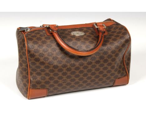 A Celine Boston leather handbag, contrast brown leather rolled handles and trim, pale gold coloured hardware and logo on fron