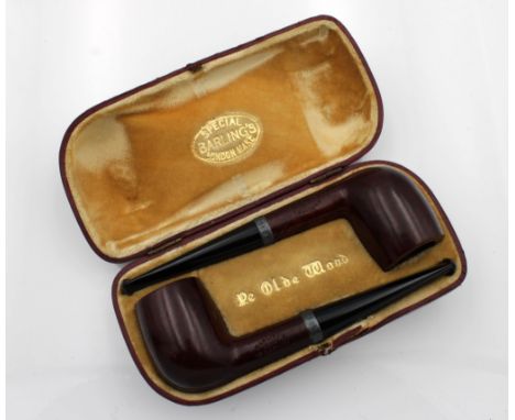 A cased pair of unused George V Barling briar pipes, with silver collars, Edwin &amp; William Barling, London,1922, both stam