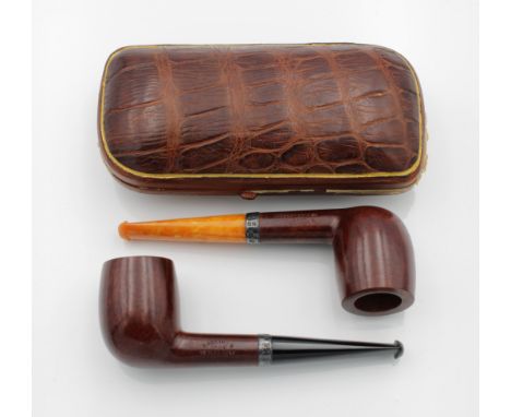 A cased pair of unused George V Barling briar pipes, with silver collars, Edwin &amp; William Barling, London,1924, both stam