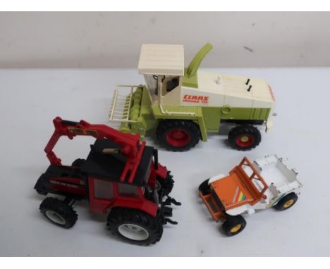 Britains die-cast model of a green tractor, flatbed trailer, another tractor, plastic Claas Jaguar combine, JCB digger, and n