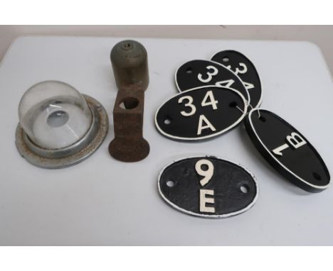 Carriage lamp with domed glass shade, cast metal whistle bell, line blocked signal block, cast iron oval shed plate 9E, and f