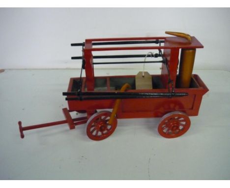 Handmade wooden model of a Victorian fire engine, with spoked wheels (37cm x 22cm) 