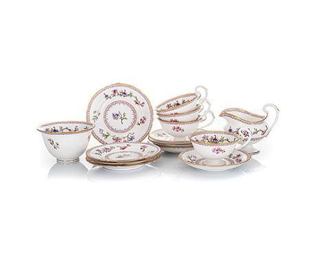 A ROYAL WORCESTER PART TEA SERVICE, 1920’S each painted with pink and blue flowers, with bands of scrolling foliage and gildi
