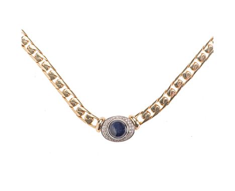 A SAPPHIRE AND DIAMOND NECKLACE comprised of flat curb link chain, centred with a bezel-set circular cabochon sapphire, withi