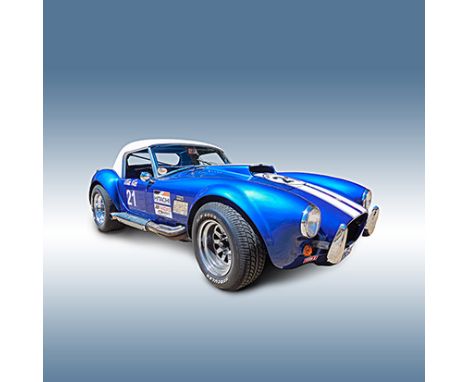 A COBRA RACE CAR Fitted with an Edelbrock 400 Chev engine, hardtop, roll cage and an extra set of racing tyres, registration 