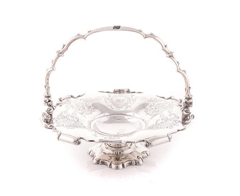 A VICTORIAN SILVER BASKET, HENRY WILKINSON & CO., SHEFFIELD, 1851 the shaped circular bowl with a scroll border and engraved 