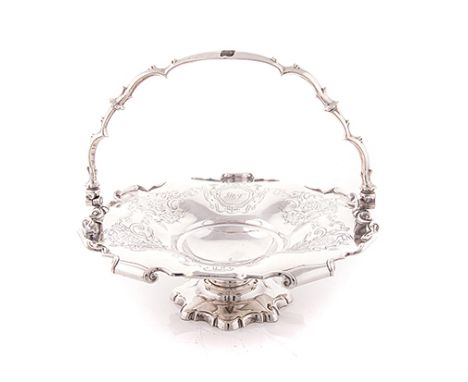 A VICTORIAN SILVER BASKET, HENRY WILKINSON & CO., SHEFFIELD, 1851 the shaped circular bowl with a scroll border and engraved 