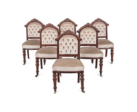 A SET OF SIX MAHOGANY UPHOLSTERED CHAIRS, 19TH CENTURY each arched carved top rail centred by a vacant cartouche, each arched