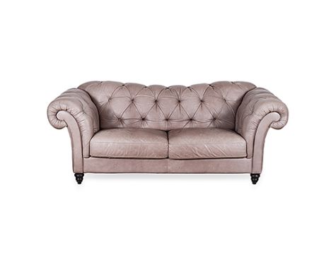 AN UPHOLSTERED CHESTERFIELD, LATE 20TH CENTURY the padded button-back between padded tufted arms, loose seat cushions, on tur