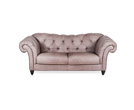 AN UPHOLSTERED CHESTERFIELD, LATE 20TH CENTURY the padded button-back between padded tufted arms, loose seat cushions, on tur