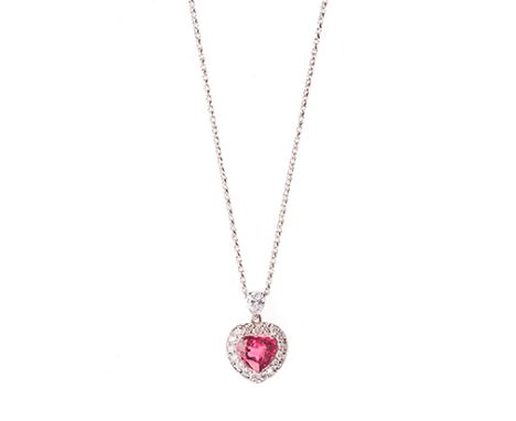 A RUBELLITE TOURMALINE AND DIAMOND PENDANT the pear-shaped diamond surmount weighing approximately 0.25cts, suspending a hear