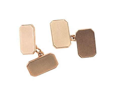 A PAIR OF GOLD CUFFLINKS each rectangular form with engine-turned detail, impressed 375 and hallmarks for Birmingham (2) 