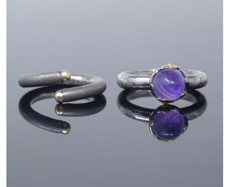 HOLGER JENSEN - a Danish oxidised and vermeil sterling silver modernist cabochon amethyst ring, size N, and WERNER GASS - a D