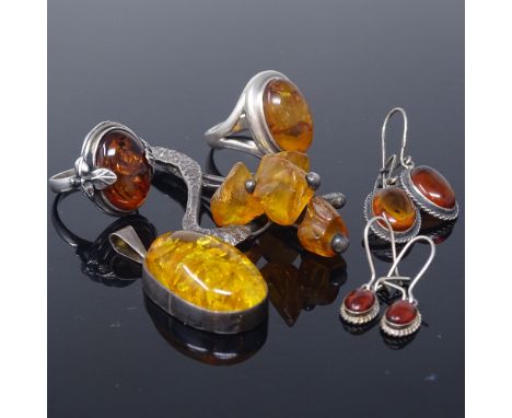 Various Scandinavian silver and Baltic amber jewellery, including floral pendant, stylised rings, earrings, etc, largest pend
