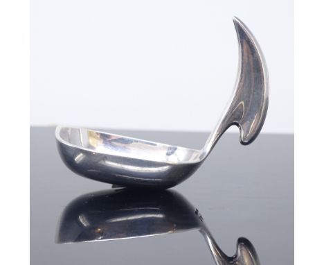 HANS HANSEN - a Danish sterling silver Viking Revival modernist caddy spoon, vertical stylised handle with rectangular bowl, 