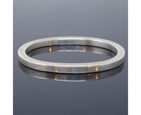 BENT OVEGAARD HANSEN - a Danish sterling silver modernist slave bangle, plain oval heavy gauge form, maker's marks BOH, band 