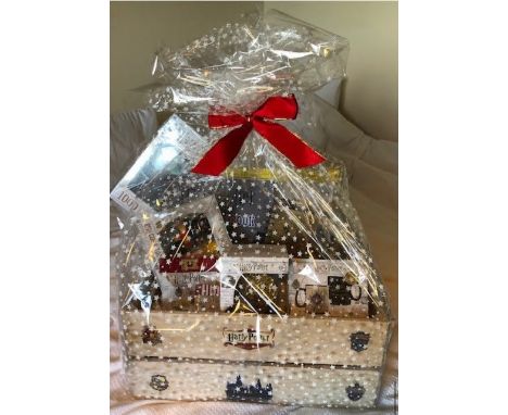 Kindly donated by Prep 2 A wonderful collection of Harry Potter items to include: Stationary Set, Egg Cup &amp; Toast Cutter,