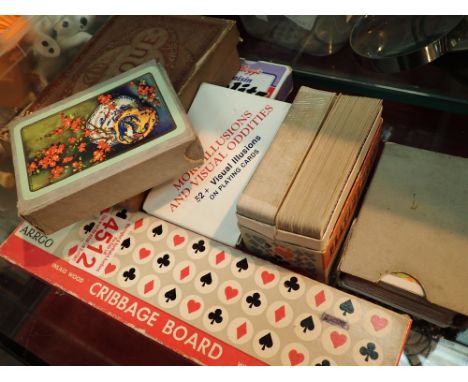 Collection of vintage playing cards including bezique and cribbage board  CONDITION REPORT: P&amp;P to a UK address = £20.00+