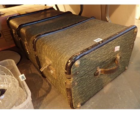 Large wood bound travelling trunk 