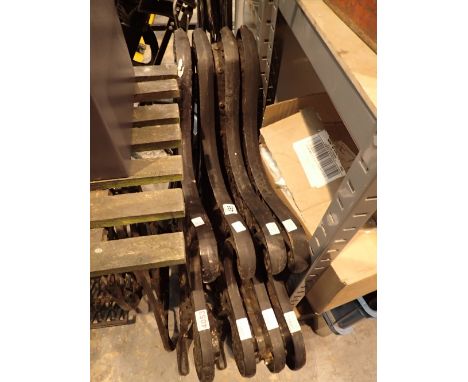 Two pairs of heavy cast iron bench ends 