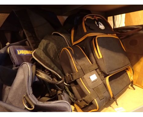 Shelf of protective camera bags holdalls and sports bags 