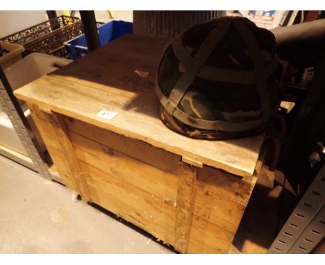 Large military pine storage box with broad arrow and a military helmet 