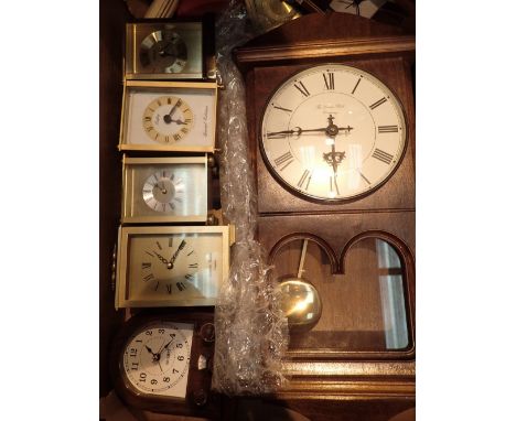 Collection of clocks including carriage clocks and a wall clock 