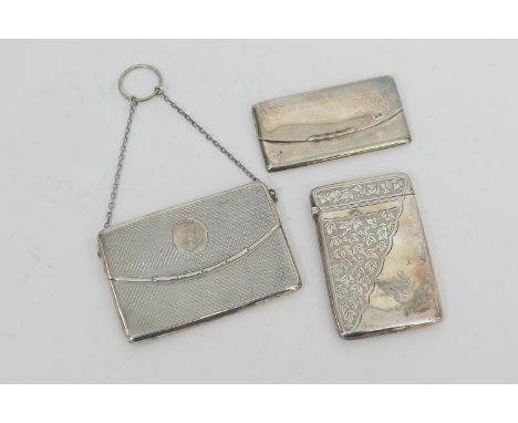 George V silver calling card purse, Birmingham 1912, rectangular form with spring cover, engine turned decoration, 9.5cm x 6c