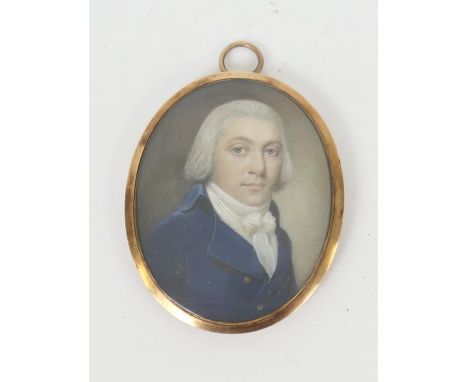 Regency portrait miniature of a gentleman, circa 1820-30, quarter length in a blue jacket, on ivory, oval, 55mm x 43mm, mount