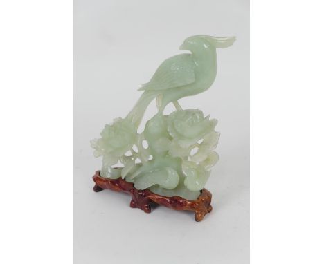 Chinese carved pale celadon jade table ornament, worked as a hawk and doves on a peony rock, 20th Century, height 24.5cm, wid