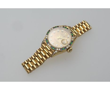 Rolex Lady-Datejust diamond, sapphire and emerald set 18ct gold Oyster Perpetual wristwatch, model 69038, circa 1990, gold co